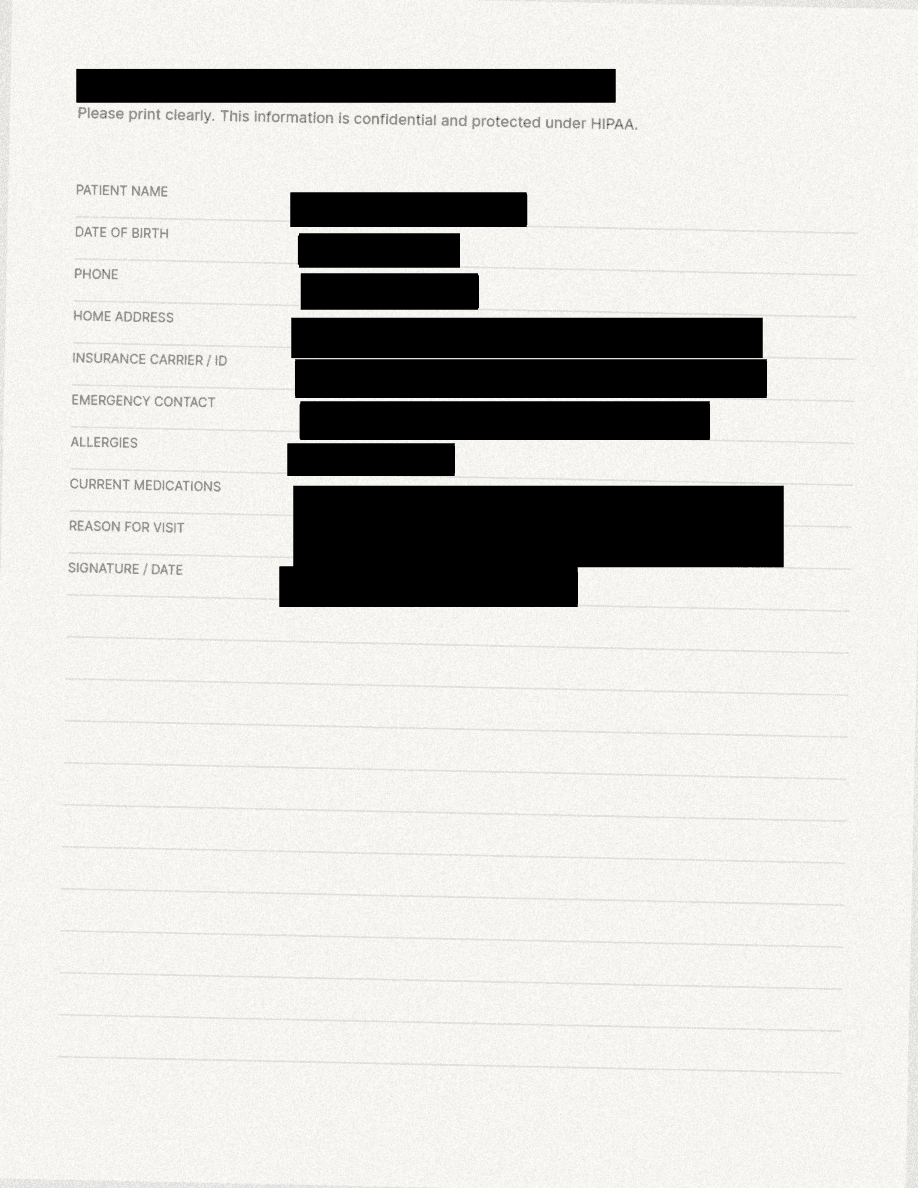 Handwritten intake form (phone-quality scan), after permanent redaction